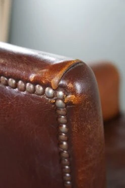 Sheepskin Armchair With A Wonderful Patina And A Correct Worn Look