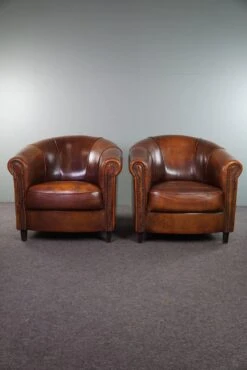 Set Of Two Club Armchairs Made Of Sheep Leather In A Beautiful Warm Dark Color -Chairly Shop 2007aaa6 61a2 4e71 b323 be7071cd7a6d