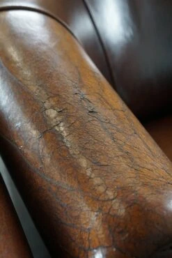 Set Of Two Club Armchairs Made Of Sheep Leather In A Beautiful Warm Dark Color