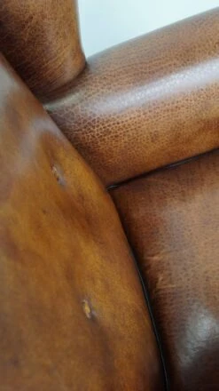 Beautiful Sheepskin Leather Wingback Armchair, With Nails And Black Piping -Chairly Shop 32f32280 b19a 480b babf c04c1cc4ee12