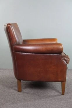 Sheepskin Armchair With A Wonderful Patina And A Correct Worn Look -Chairly Shop 4af470fe e20e 4aca ae75 58af56de22a1