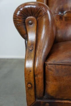Irresistible Old Sheep Leather Wingback Armchair With The Most Beautiful Colors -Chairly Shop 5f270c31 a8ac 4598 b035 be906c45d95f