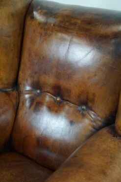 Irresistible Old Sheep Leather Wingback Armchair With The Most Beautiful Colors -Chairly Shop 70fb63e6 89df 4e4d 8a9f b9dc56b344f6