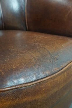 Set Of Two Club Armchairs Made Of Sheep Leather In A Beautiful Warm Dark Color -Chairly Shop 7f3093b1 d895 4a4d 91f0 9b18c18a9861