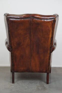 Large Sheepskin Leather Wingback Armchair With A Fixed Seat Cushion And A Stunning Patina -Chairly Shop 864c2cdd 8921 46b8 bbaf 4ad431eaa3e0