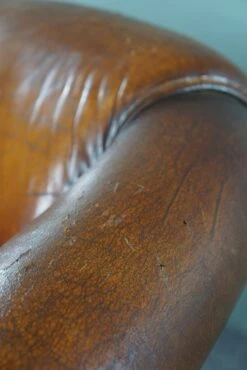 Comfortable And Rugged Vintage Sheepskin Club Armchair With Beautiful Colors -Chairly Shop 8e61738f e16b 45ad 99c7 20cf087804cf