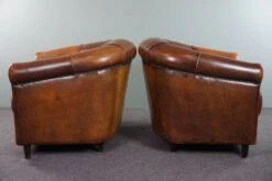 Set Of Two Club Armchairs Made Of Sheep Leather In A Beautiful Warm Dark Color -Chairly Shop 94396a39 6d38 4b33 9f15 21b40e7da01f