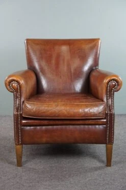 Sheepskin Armchair With A Wonderful Patina And A Correct Worn Look -Chairly Shop 9b795343 29f2 45c8 9613 8033671b805f