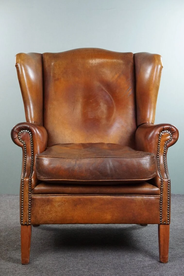 Very Rugged Wingback Armchair Made Of Cognac-colored Sheep Leather Finished With Decorative Nail Hea 4 Very Rugged Wingback Armchair Made Of Cognac-colored Sheep Leather Finished With Decorative Nail Hea - Image 2