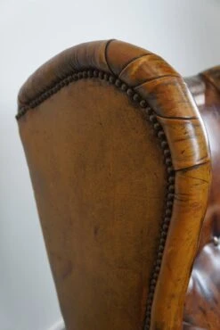 Irresistible Old Sheep Leather Wingback Armchair With The Most Beautiful Colors -Chairly Shop c6166968 baf2 4663 8403 a8ccdaa4a219