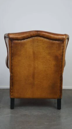 Beautiful Sheepskin Leather Wingback Armchair, With Nails And Black Piping -Chairly Shop c9b1f4f1 1510 4c2b a935 536b4116a2d0