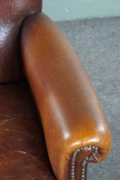 Sheepskin Armchair With A Wonderful Patina And A Correct Worn Look -Chairly Shop cc3d76f9 d7a4 4500 bbbf a80c01325032