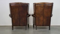 Set Of Two In Very Good Condition Dark Sheepskin Leather Wingback Armchairs 20 Set Of Two In Very Good Condition Dark Sheepskin Leather Wingback Armchairs -Chairly Shop d8d039dd 3021 409e a4e4 02be2ea3c378