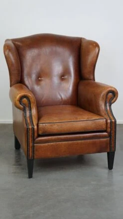 Beautiful Sheepskin Leather Wingback Armchair, With Nails And Black Piping -Chairly Shop dc0fa15c a735 49f3 8810 0deaf0ff237f