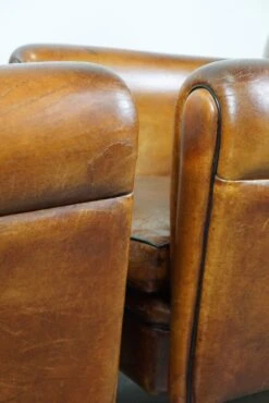 Set Of Two Sheep Leather Art Deco Style Design Armchairs With A Beautiful Patina 25 Set Of Two Sheep Leather Art Deco Style Design Armchairs With A Beautiful Patina -Chairly Shop e575ded6 faa4 4ba1 a9f1 604537c00e9c