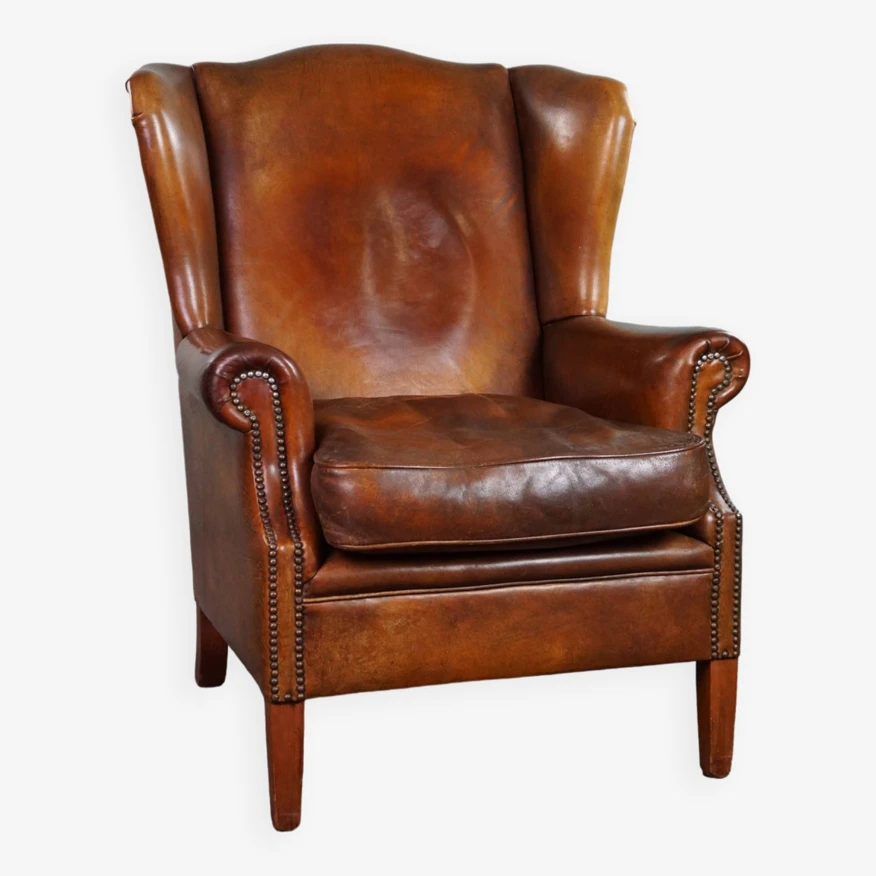 Very Rugged Wingback Armchair Made Of Cognac-colored Sheep Leather Finished With Decorative Nail Hea 7 Very Rugged Wingback Armchair Made Of Cognac-colored Sheep Leather Finished With Decorative Nail Hea - Image 5